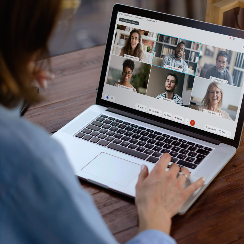 Person meets with teammates using Webex