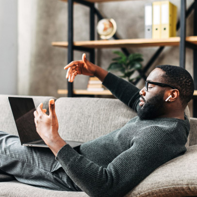 Person takes a Webex call while relaxing